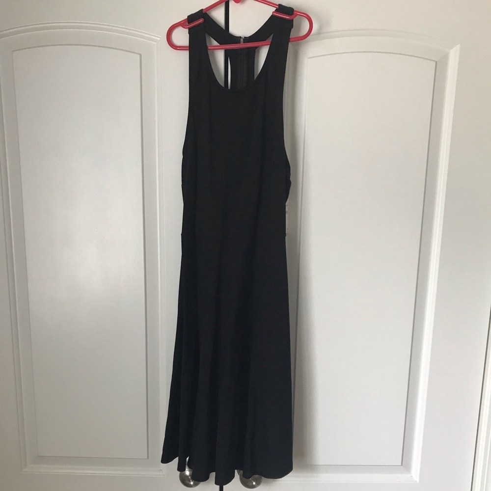 The vanity room black, racer back dress.